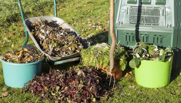 Organic compost,compost bin in a autumn garden.